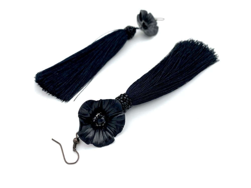 Handmade black dangle earrings with long tassels and flowers made from polymer clay enriched with beads and rhinestones