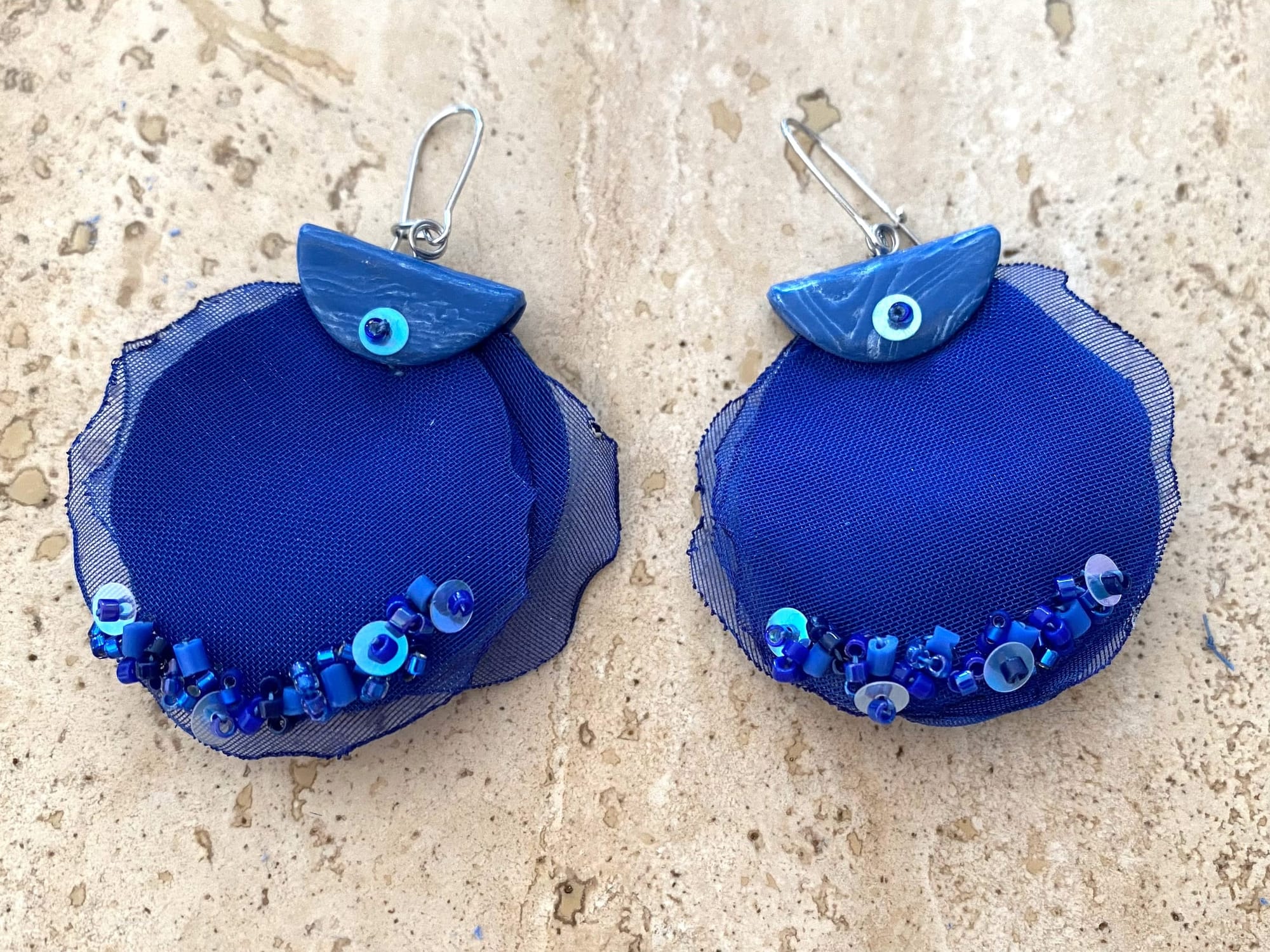 The second pair of earrings is made with differently shaped polymer clay elements.