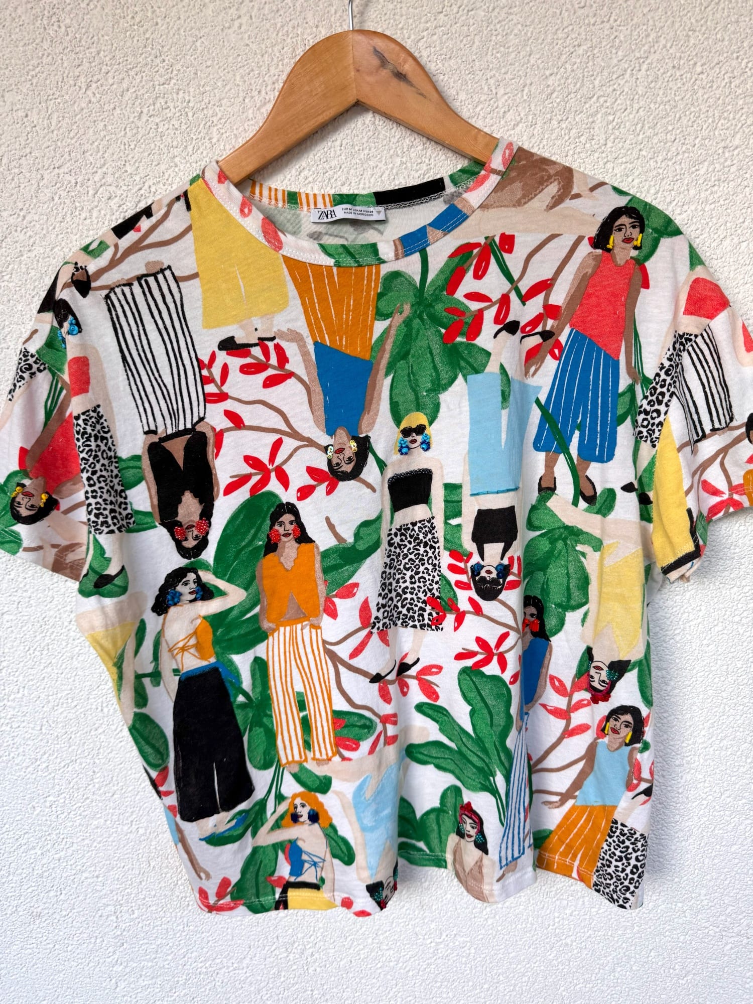 T-shirt embellished with sequins, bugle beads, and Toho beads