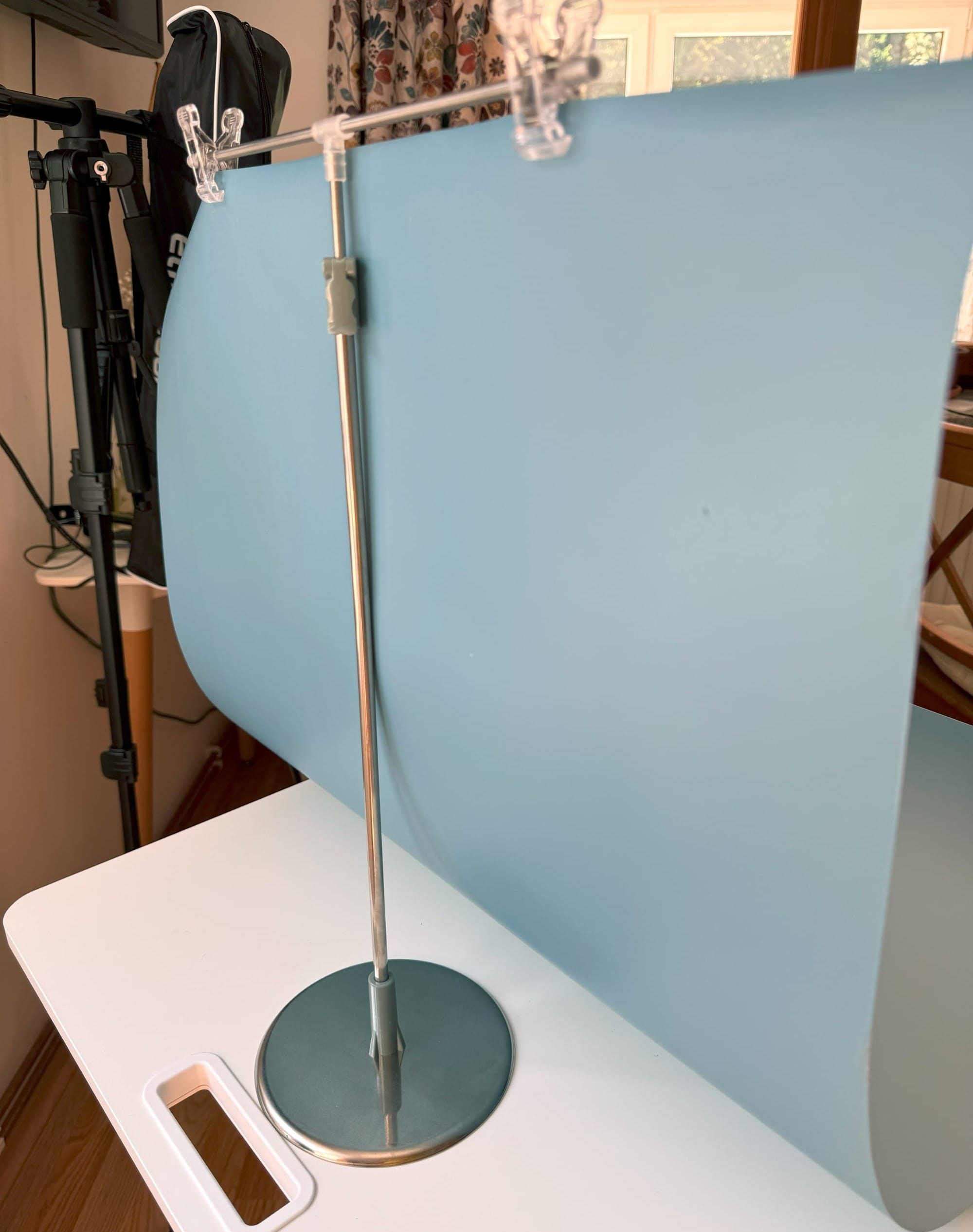 Background holder with background attached. View from the back. 